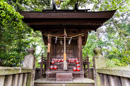 Kurashiki, Japan - April 28, 2014: View of a subshrine in Achi shinto shrine. Located on the hill overlooking the historical area of Kurashiki, Achi Shrine in 1990 as celebrated its 1700th anniversaryのeditorial素材