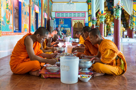 Bakong, Cambodia - January 04, 2017: Buddhist monks take lunch at the Bakong monastery, outside Bakong temple near Angkor Watのeditorial素材