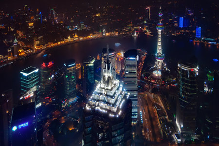 Shanghai, China - August 16, 2011: View of the skyscrapers of Pudong district at night from the observation deck of the Shanghai World Financial Centerのeditorial素材