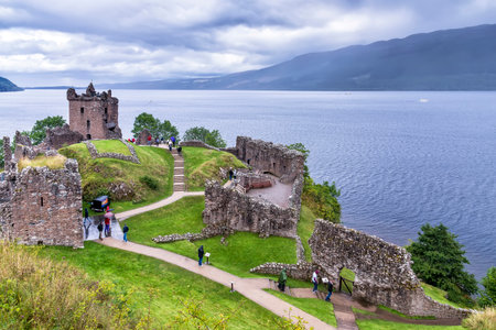 Drumnadrochit, United Kingdom - August 19, 2014: View of Urquhart Castle ruins beside Loch Ness, in the Highlands of Scotlandのeditorial素材