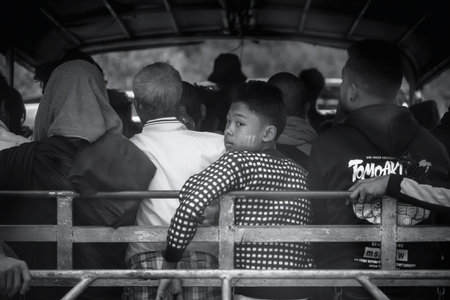 Kin Pun, Myanmar - December 30, 2019: A crammed truck on the road for Kyaiktiyo Pagoda. The only way...