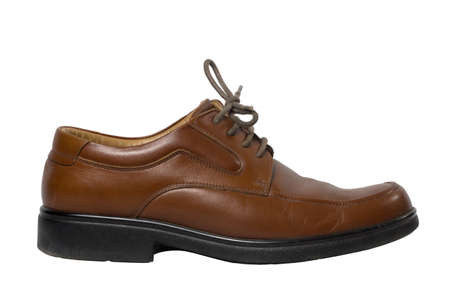 Pair of brown male classic shoes isolated on white background の写真素材