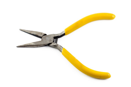Orange pliers isolated on whiteの写真素材