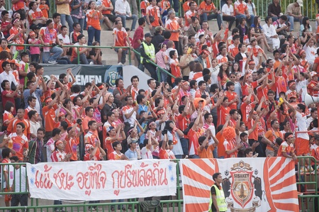 BANGKOK THAILAND- MAR19: Thai Premier League (TPL) between Army Utd. (green) vs Sisaket Mungthail Fc (pring) on March 19, 2011 at Army Stadium in Bangkok Thailand のeditorial素材