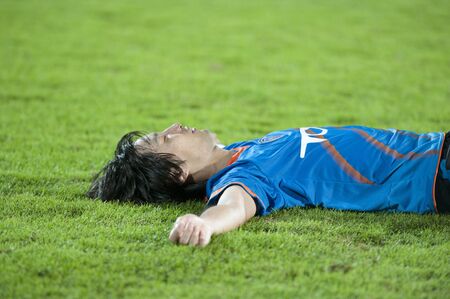 BANGKOK THAILAND- APRIL 3 : Thai Premier League (TPL) between TOT (Blue) vs BC Fc (Green) on April 3, 2011 at  Thunderdome Stadium Bangkok, Thailandのeditorial素材