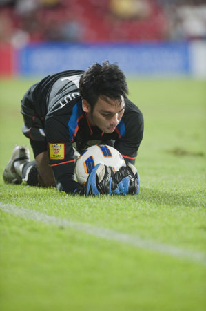 BANGKOK THAILAND- APRIL 3 : Thai Premier League (TPL) between TOT (Blue) vs BC Fc (Green) on April 3, 2011 at  Thunderdome Stadium Bangkok, Thailandのeditorial素材
