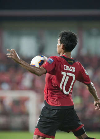 NONTHABURI THAILAND- APRIL 12 : AFC CUP between Muang Thong utd (Red) vs Victory sc  (white) on April 12, 2011 at  Yamaha Stadium Nonthaburi, Thailandのeditorial素材