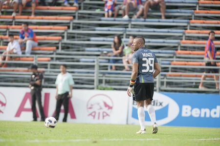 BANGKOK THAILAND- MAY 25 : Thai Premier League (TPL) between thai port fc (Orange) vs TTM Pijit (yellow)   on Msy 25, 2011 at PAT Stadium in Bangkok Thailand のeditorial素材