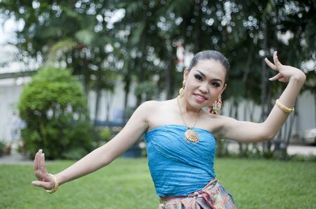 BANGKOK, THAILAND - JULY 10 : Thai traditional dance. This is the parade of making traditional merit of people from the northern territory of Thailand, July 10, 2011 in Bangkok, Thailand. のeditorial素材