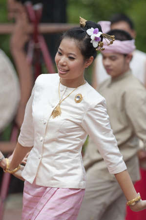 BANGKOK, THAILAND - JULY 10 : Thai traditional dance. This is the parade of making traditional merit of people from the northern territory of Thailand, July 10, 2011 in Bangkok, Thailand. のeditorial素材