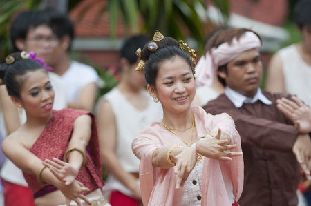 BANGKOK, THAILAND - JULY 10 : Thai traditional dance. This is the parade of making traditional merit of people from the northern territory of Thailand, July 10, 2011 in Bangkok, Thailand. のeditorial素材