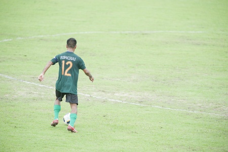 BANGKOK THAILAND - JULY 20 : Toyota League Cup between BBCU fc (prink) vs Kasetsat fc (green) on July 20, 2011 at  Kasetsat Stadium Bangkok, Thailand のeditorial素材