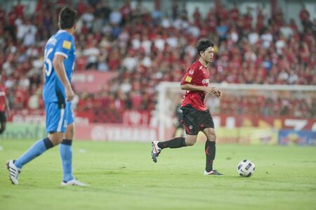 BANGKOK THAILAND- AUGUST 10 : Thai Premier League (TPL) between Muangthong United vs Bangkok Glass Fc on August 10, 2011 at Yamaha Stadium Bangkok, Thailand のeditorial素材