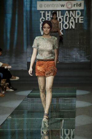 BANGKOK, THAILAND - SEPTEMBER 16 : Model showcases on the catwalk during Thailand Graduate Fashion Week 2011 ( TGFW ) on September 16, 2011 in Bangkok Thailand. のeditorial素材