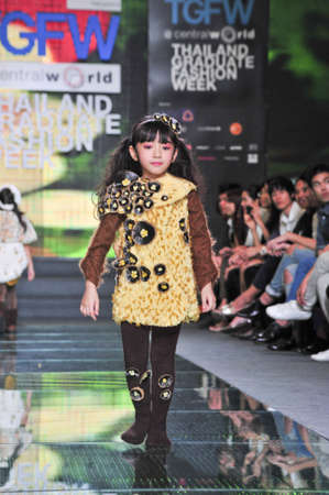 BANGKOK, THAILAND - SEPTEMBER 16 : Model showcases on the catwalk during Thailand Graduate Fashion Week 2011 on September 16, 2011 in Bangkok Thailand. のeditorial素材