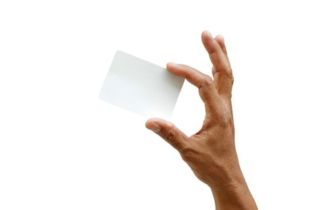 Hand and a card isolated on white の写真素材
