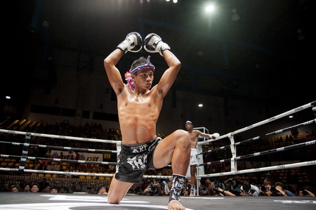 BANGKOK THAILAND- SEPTEMBER 25 : Thai Fight : Muay Thai..World's Unrivalled Fight on September 25, 2011 at Thammasat University Cnvention Center,Bangkok Thailandのeditorial素材