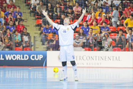 BANGKOK, THAILAND - NOV 04: Unidentified players in FIFA Futsal World Cup Group A match between Thailand (R) and Ukraine (Y) at Indoor Stadium Huamark on November 4, 2012 in Bangkok, Thailand. のeditorial素材