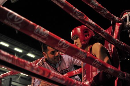 BANGKOK, THAILAND- MARCH 18 : R.Khaled (R) and W.Manghgam (B) in Muaythai World Championship 2013 on March 18, 2013 at Nimitbut Stadium, Bangkok, Thailand のeditorial素材