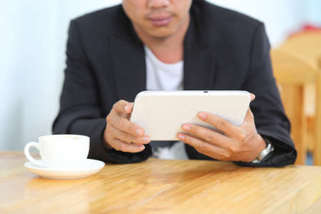 image of a asia businessman in a coffee shopの写真素材