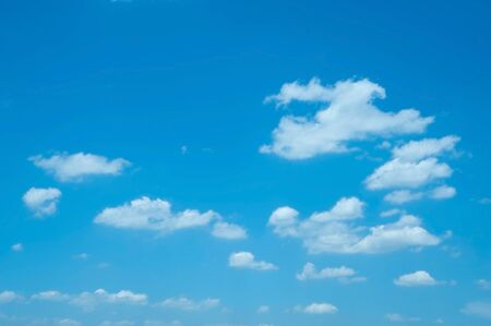Beautiful Blue Sky Background Template With Some Space for Input Text Message Below Isolated on Blue skyの写真素材