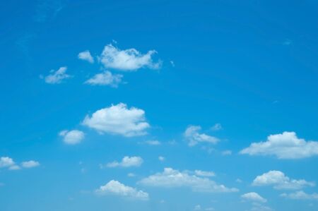 Beautiful Blue Sky Background Template With Some Space for Input Text Message Below Isolated on Blue skyの写真素材