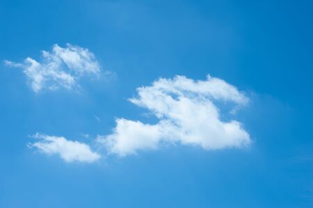 Beautiful Blue Sky Background Template With Some Space for Input Text Message Below Isolated on Blue skyの写真素材