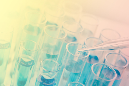 Test tubes closeup on blue background..medical glasswareの写真素材