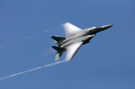 F-15 Eagle making a high speed pass with the afterburner on