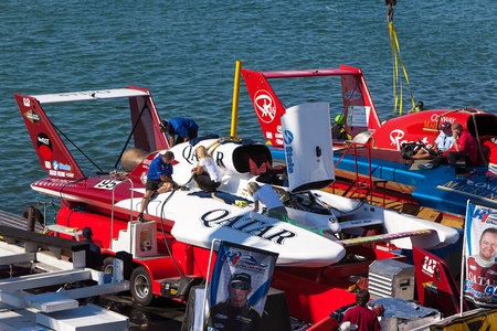 DETROIT - JULY 13: The Qatar hydroplane prepares for testing at the APBA Gold Cup July 13, 2013 on the Detroit River in Detroit, Michigan.のeditorial素材