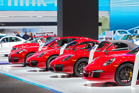 DETROIT - JANUARY 15: A row of Porsches on display January 13th, 2015 at the 2015 North American International Auto Show in Detroit, Michigan.のeditorial素材