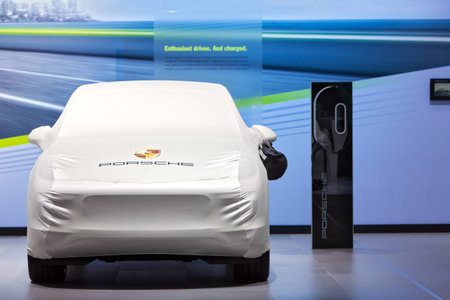 DETROIT - JANUARY 12: A Porsche Cayenne sits under wraps January 12th, 2015 at the 2015 North...