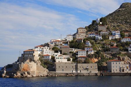 Sea landscape with houses on seacoast in Greeceの写真素材