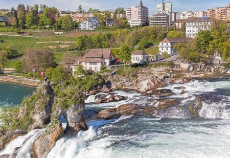 Neuhausen am Rheinfall, Switzerland - 17 April, 2014: the Rhine Falls. The Rhine Falls (German: Rheinfall) is the largest plain waterfall in Europe.のeditorial素材