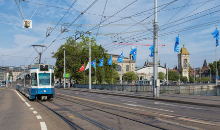 Zurich, Switzerland - 9 August, 2015: tram passing the Bahnhofbruecke bridge. Zurich is the largest...