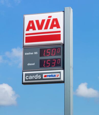Einsiedeln, Switzerland - 7 September, 2015: AVIA sign with gasoline and diesel prices in Swiss Francs at the filling station. AVIA International is a headquartered in Zurich, Switzerland company, which is currently represented by more than 2900 petrol stのeditorial素材