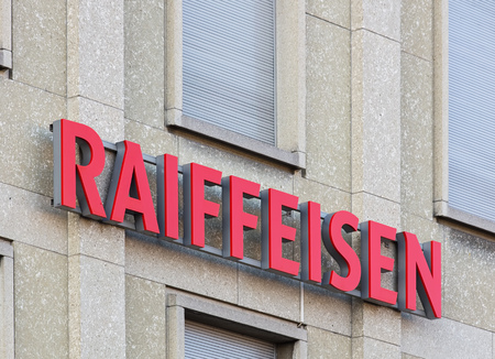 Lucerne, Switzerland - 3 October, 2015: Raiffeisen sign on the wall of the office building on the Bahnhofstrasse street. Raiffeisen is a Swiss cooperative bank. After the UBS and the Credit suisse, it is the third largest bank in Switzerland.のeditorial素材