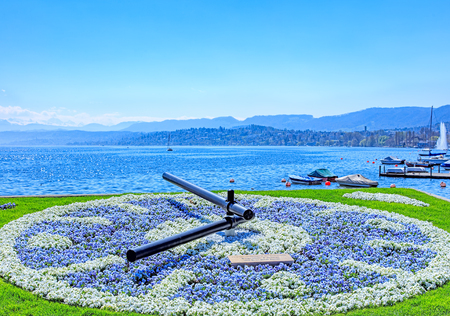 Zurich, Switzerland - 11 April, 2016: view on the Lake Zurich from Burkliplatz square with the floral clock in the foreground. Zurich is the largest city in Switzerland and the capital of the Swiss canton of Zurich.のeditorial素材