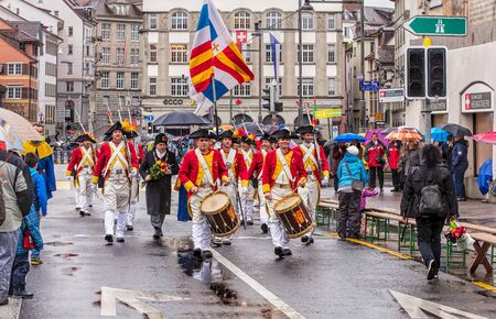 Zurich, Switzerland - 18 April, 2016: participants of the Sechselauten parade passing along Uraniastrasse street. Sechselauten is a traditional spring holiday in the city of Zurich, usually celebrated on the 3rd Monday of April.のeditorial素材