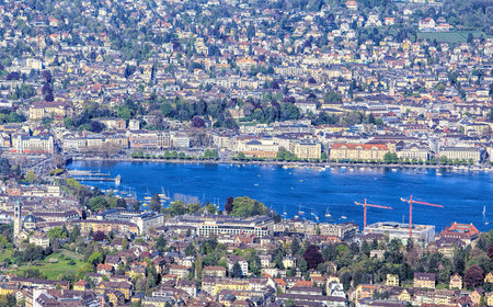 Zurich, Switzerland - 20 April, 2016: view on the city of Zurich and Lake Zurich from Mt. Uetliberg. Mt.Uetliberg is a mountain of the Swiss plateau, rising to 869 m, it offers a panoramic view on the entire city of Zurich and the Lake Zurich. Zurich is tのeditorial素材