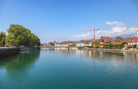 Solothurn, Switzerland - 19 July, 2013: view along Aare river. Aare is the longest river that both rises and ends entirely within Switzerland. The city of Solothurn is the capital of the Swiss Canton of Solothurn and is also the only municipality of the dのeditorial素材