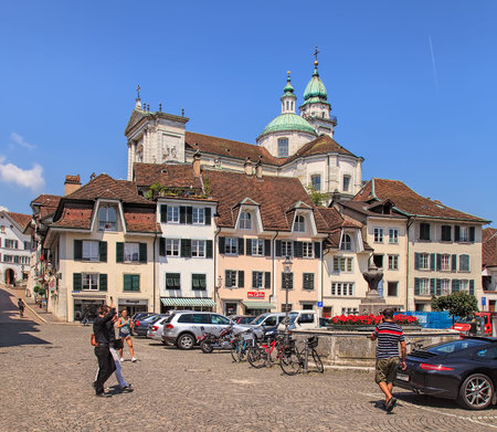 Solothurn, Switzerland - 19 July, 2013: view the old town of the city with the towers of the St. Ursus cathedral in the background. The St. Ursus Cathedral is a Swiss heritage site of national significance.のeditorial素材