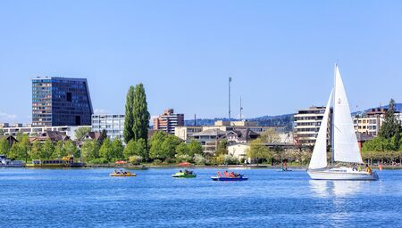 Zug, Switzerland - 6 May, 2016: view on the city of Zug from Lake Zug. The city of Zug is the capital of the Swiss canton of Zug. Lake Zug (German: Zugersee) is a lake in central Switzerland, situated between Lake Lucerne and Lake Zurich.のeditorial素材