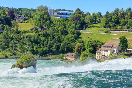 Neuhausen am Rheinfall, Switzerland - 22 June, 2016: the Rhine Falls. The Rhine Falls (German: Rheinfall) is the largest plain waterfall in Europe, located on the Rhine river between the municipalities of Neuhausen am Rheinfall (canton of Schaffhausen) anのeditorial素材