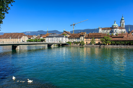 Solothurn, Switzerland - 10 July, 2016: cityscape with the Aare river, Kreuzackerbruecke bridge and the St. Ursus Cathedral. The city of Solothurn is the capital of the Swiss Canton of Solothurn and is also the only municipality of the district of the samのeditorial素材