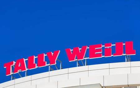 Basel, Switzerland - 27 August, 2016: Tally Weijl sign on the top of an office building. Tally Weijl is a fashion label based in Basel, Switzerland, it is represented worldwide in 37 countries with over 780 stores.のeditorial素材