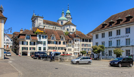 Solothurn, Switzerland - 10 July, 2016: view on Klosterplatz square with towers of the St. Ursus Cathedral in the background. The city of Solothurn is the capital of the Swiss Canton of Solothurn.のeditorial素材