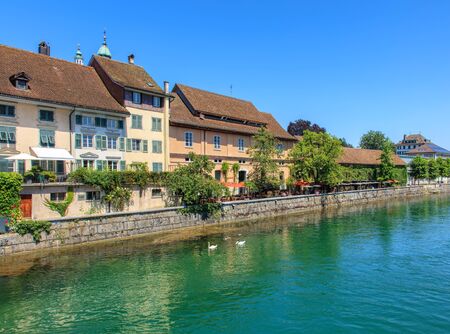 Solothurn, Switzerland - 10 July, 2016: buildings on the Ritterquai quay of the Aare river. The city of Solothurn is the capital of the Swiss Canton of Solothurn and is also the only municipality of the district of the same name.のeditorial素材