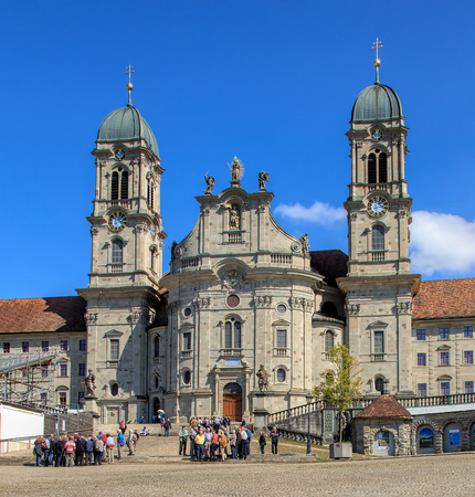 Einsiedeln, Switzerland - 8 September, 2015: people at the entrance to the Einsiedeln Abbey. Einsiedeln Abbey is a Benedictine monastery in the town of Einsiedeln in the Swiss Canton of Schwyz.のeditorial素材