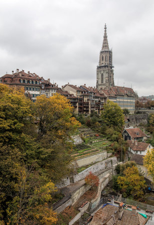 Bern, Switzerland - 19 October, 2015: view with the Bern Minster building on an overcast day. The...